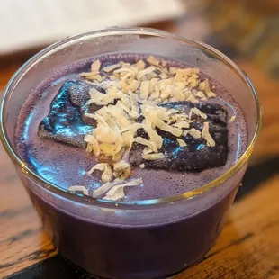 a blueberry smoothie in a glass bowl