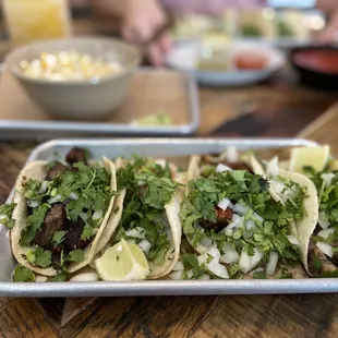 Carne Asada taco, shrimp taco, chorizo taco and lengua taco (All tacos were in corn tortilla)