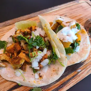 Pollo Asado Taco and Squash, Kale, and Mushroom Taco