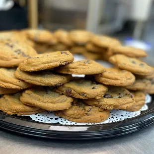 a pile of chocolate chip cookies