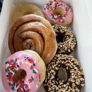 a variety of donuts in a box