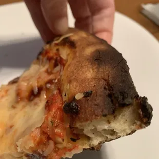 Burned cheese pizza
