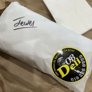 a wrapper with a sticker on it