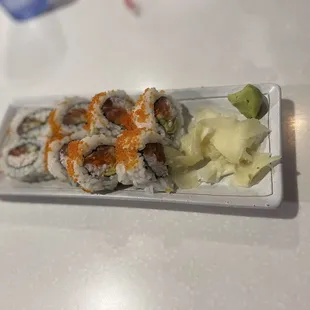 a plate of sushi on a table