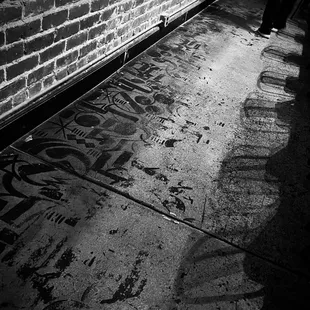 Graffiti art on the concrete floor.