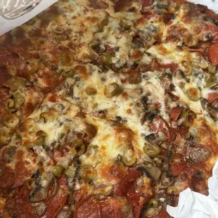 12&quot; Medium - Thin Crust Pizza Pepperoni, sausage , mushroom, green olive slices.  Always order this for last 5 years