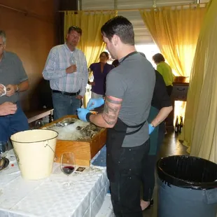 Taylor Shellfish shucking oysters during our release of our Dry Riesling