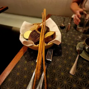 Fresh baked bread and bread sticks in sweet semolina flour
