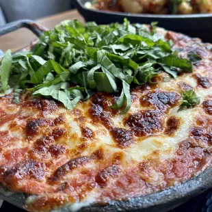 a pizza in a pan on a table
