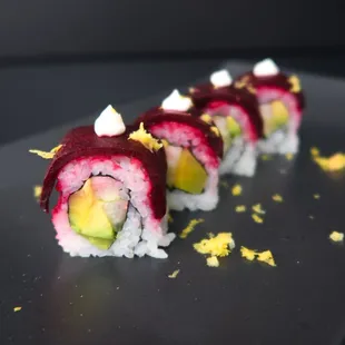 a sushi roll on a plate