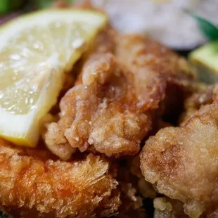 Shrimp and chicken karaage bento - close-up shrimp (L), karaage (R)