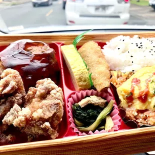 My hamburger steak/chicken karaage bento with white/ ketchup rice.