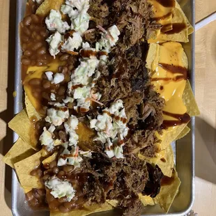 Obichos- pulled pork nachos with baked beans and Cole slaw.   Excellent choice!