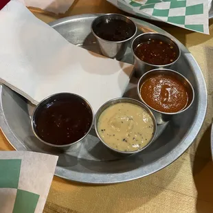 Sauce taster. Sweet, white, sriracha, Carolina style, and spicy.