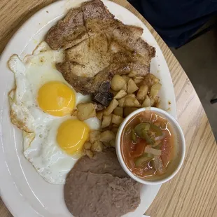 Pork steak w/two egg's definitely