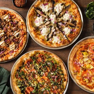 a variety of pizzas