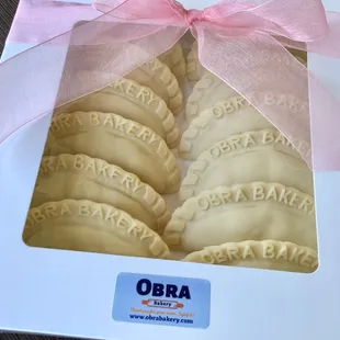 Frozen Empanadas, ready to bake! Instructions provided. Get 2 FREE Empanadas with every dozen. Order online at www.obrabakery.com.