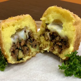 Potato Ball filled with ground beef and mozzarella cheese, coated with panko.