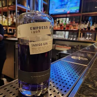a bottle of indigo gin