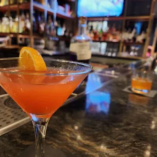 a cocktail in a martini glass