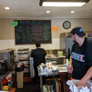 a man preparing food in a kitchen