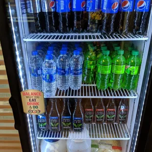a display of pepsi sodas and soft drinks