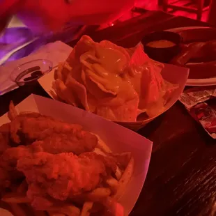 Cheese nachos, pretzel, and chicken tenders+fries