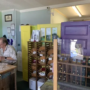 a man working in a wine shop