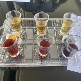 You get 6 little glasses of wine for $15 and a souvenir glass!