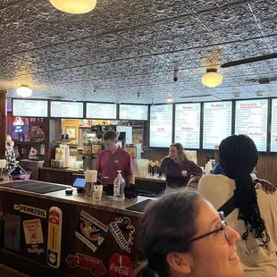 a group of people in a restaurant