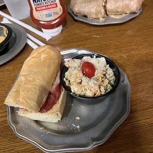 Corned beef po-boy with seafood pasta salad