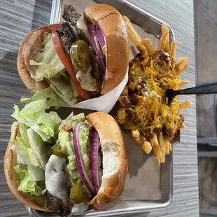two burgers and french fries