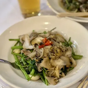 Stir fried water spinach & conch meat (unpleasant because of shells or rocks)