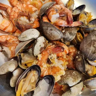 Garlic butter headless shrimps $18.99 lbs , clams $15.99 lbs