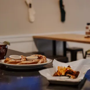 House beers, jumbo pretzel, chicken wings