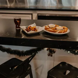 Chicken wings Wings and jumbo pretzel with beer cheese and mustard