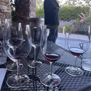 a table with wine glasses on it