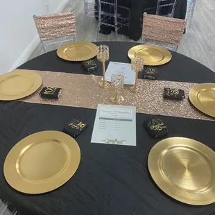 Guest table with party favors, menu and agenda for evening