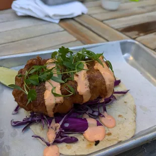 Fish Taco ($14) - 4.5 stars. A single giant fish taco, very delicious, fresh tasting fish, nice thick crunchy crisp. Sat dinner 2024-06-22