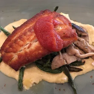 Pan-seared flounder on garlic mashed potatoes with green beans and mushrooms