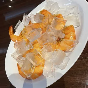Boiled shrimp. The server added the ice. Thank goodness he did because they were borderline overcooked. No attempt at presentation.
