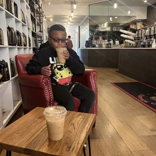 Jordan enjoying his first latte experience