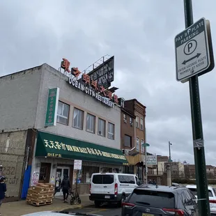 a view of a chinese restaurant from across the street