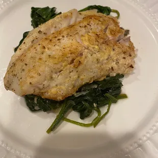 Pan seared trout with dion/butter sauce with sautéed spinach.