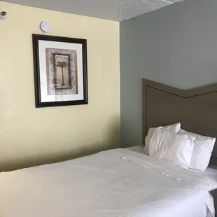 Drear depressing room and uncomfortably hard beds