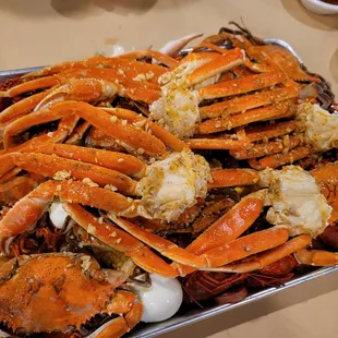 a platter of cooked crabs
