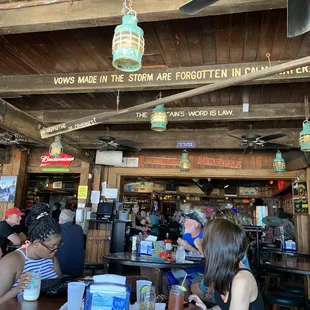 Seating in this picture was inside but the whole back side is open to the beach.