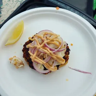 Crab cake, pure flavor no bread crumbs.