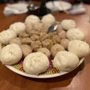 a plate of steamed dumplings