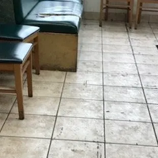 Seats were torn/place was dirty panes were smudged, trash was on the floor